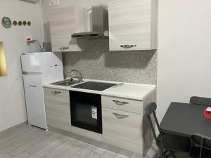 Kuchyň nebo kuchyňský kout v ubytování B&b Paradiso Settecannelle