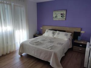 Katil atau katil-katil dalam bilik di CA Apartamentos Pampin Ponte do Porto