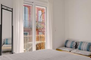 Un pat sau paturi într-o cameră la Preveza life apartment