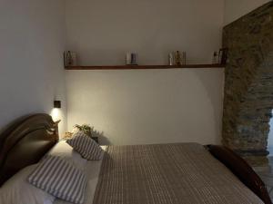 מיטה או מיטות בחדר ב-Casa Margot