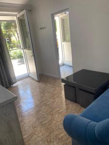 Posezení v ubytování Maguli Home Gonio