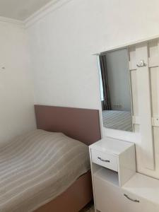 Postel nebo postele na pokoji v ubytování Maguli Home Gonio