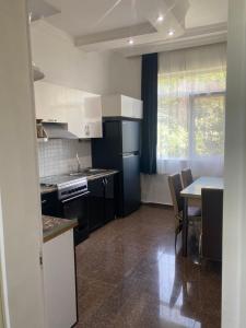 Kuchyň nebo kuchyňský kout v ubytování Maguli Home Gonio