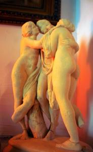 a statue of two people hugging each other at Beautiful Vintage House in Vis +25 photos