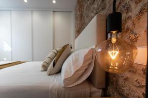 Postel nebo postele na pokoji v ubytování Zalaeta Playa Apartments