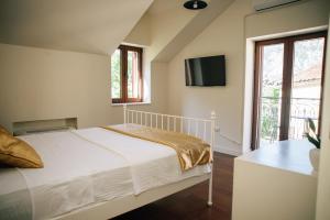 Filip Deluxe Rooms客房内的一张或多张床位