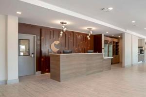 a lobby with a reception desk in a building at Comfort Inn & Suites Destin near Henderson Beach in Destin