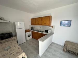 Фотография из галереи Santorini Grace Villa 3 в городе Foinikiá