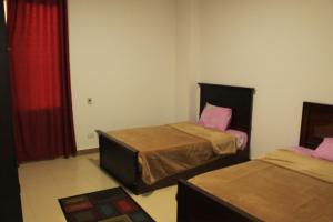 Postel nebo postele na pokoji v ubytování 610 rooms