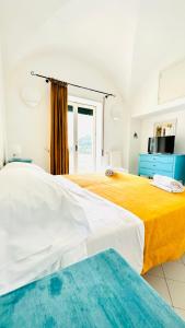 Łóżko lub łóżka w pokoju w obiekcie Villa La Zagara by CapriRooms