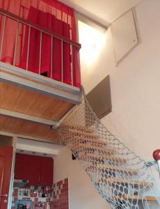a net hanging from the ceiling of a room at Sea Mona in Tivat
