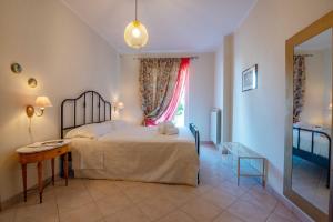 Postel nebo postele na pokoji v ubytování B&b Dea Teti