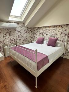 Filip Deluxe Rooms客房内的一张或多张床位