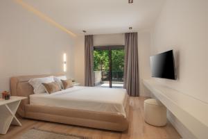 A bed or beds in a room at Enclave Villa Luxury,Pool and Nature at Marmaris