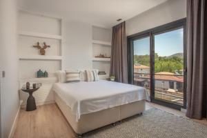 A bed or beds in a room at Enclave Villa Luxury,Pool and Nature at Marmaris