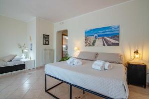 Postel nebo postele na pokoji v ubytování B&b Dea Teti