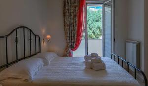 Postel nebo postele na pokoji v ubytování B&b Dea Teti