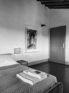 A bed or beds in a room at Podere San Giorgio
