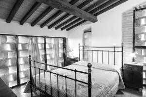 A bed or beds in a room at Podere San Giorgio