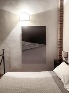 A bed or beds in a room at Podere San Giorgio