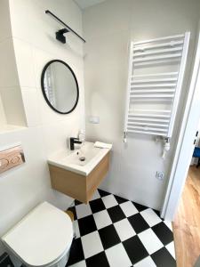Kúpeľňa v ubytovaní Apartamenty Pałacowe