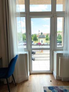 Posedenie v ubytovaní Apartamenty Pałacowe