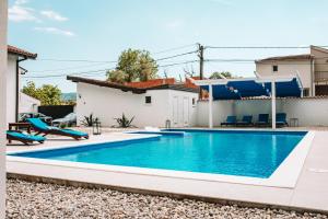 a swimming pool in the backyard of a house at MaNe in Mostar