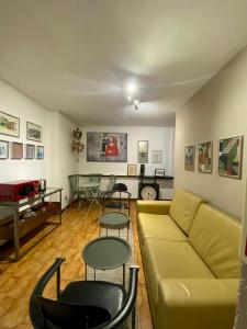 a living room with a couch and chairs and a table at Jardim do Morro Places in Vila Nova de Gaia +58 photos