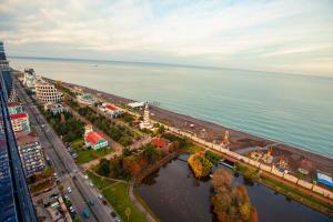 an aerial view of a city next to the water at PANORAMA Center Suite in Batumi