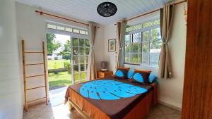 Cama ou camas em um quarto em TAHITI - Motu Nono Beach View