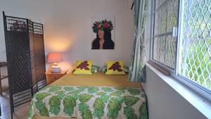 Cama ou camas em um quarto em TAHITI - Motu Nono Beach View