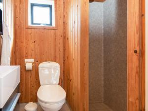 a bathroom with a white toilet and a shower at 9 person holiday home in Harboøre-By Traum in Harboør +38 photos