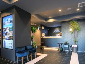Posezení v ubytování HOTEL LiVEMAX Machida-Ekimae