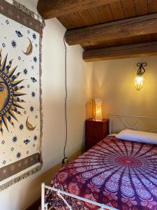 Postel nebo postele na pokoji v ubytování Villa Siciliana con piscina e vista panoramica sul mare