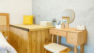 Llit o llits en una habitació de Island Flower Inn