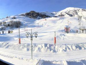 Imagen de la galería de Duplex spacieux sur pistes, balcon, idéal 8/10 pers, linge inclus hiver - FR-1-267-255, en Villarembert