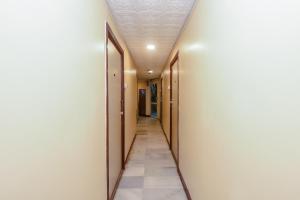 a corridor of a hallway with at Flagship Hotel Prince Palace Near Juhu Beach in Mumbai