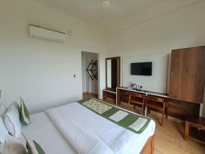 Μια τηλεόραση ή/και κέντρο ψυχαγωγίας στο Hotel Dream Orchid +6 φωτογραφίες