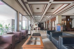 Posezení v ubytování Istana Hotel Bandung Mitra RedDoorz + 37 fotografií