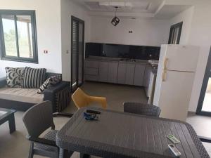 A kitchen or kitchenette at Waterfront High Standing in Dar Allouche - Klibia - Nabeul