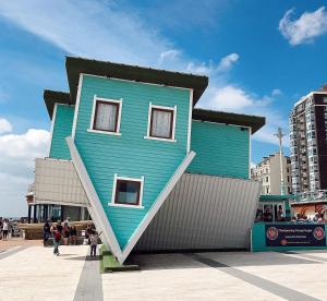 a blue house with a stairewayigunigunigunigun at Stylish Retreat in Hove