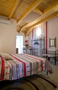 Giường trong phòng chung tại Villa Ragusa Vecchia