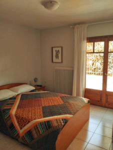 Posteľ alebo postele v izbe v ubytovaní Electra Apartment in Epidaurus