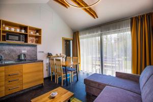 Kuchyň nebo kuchyňský kout v ubytování Holiday Village Tatralandia