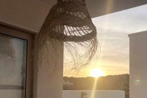 a net hanging from the ceiling of a room at Burgau Village and Sea in Burgau