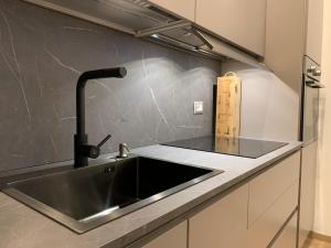 Kuchyň nebo kuchyňský kout v ubytování Ritratto Sul Mare