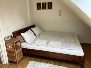 Voodi või voodid majutusasutuse Private apartments in Preila toas