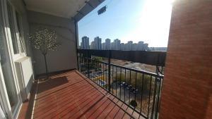 a balcony with a view of a city skyline at Cezar Apartment in Belgrade