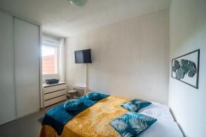 Katil atau katil-katil dalam bilik di Soleil sur la Massane - Appartement avec terrasse