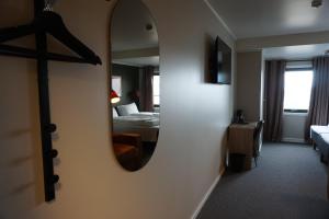 Postel nebo postele na pokoji v ubytování Verdde Hotel Lakselv
